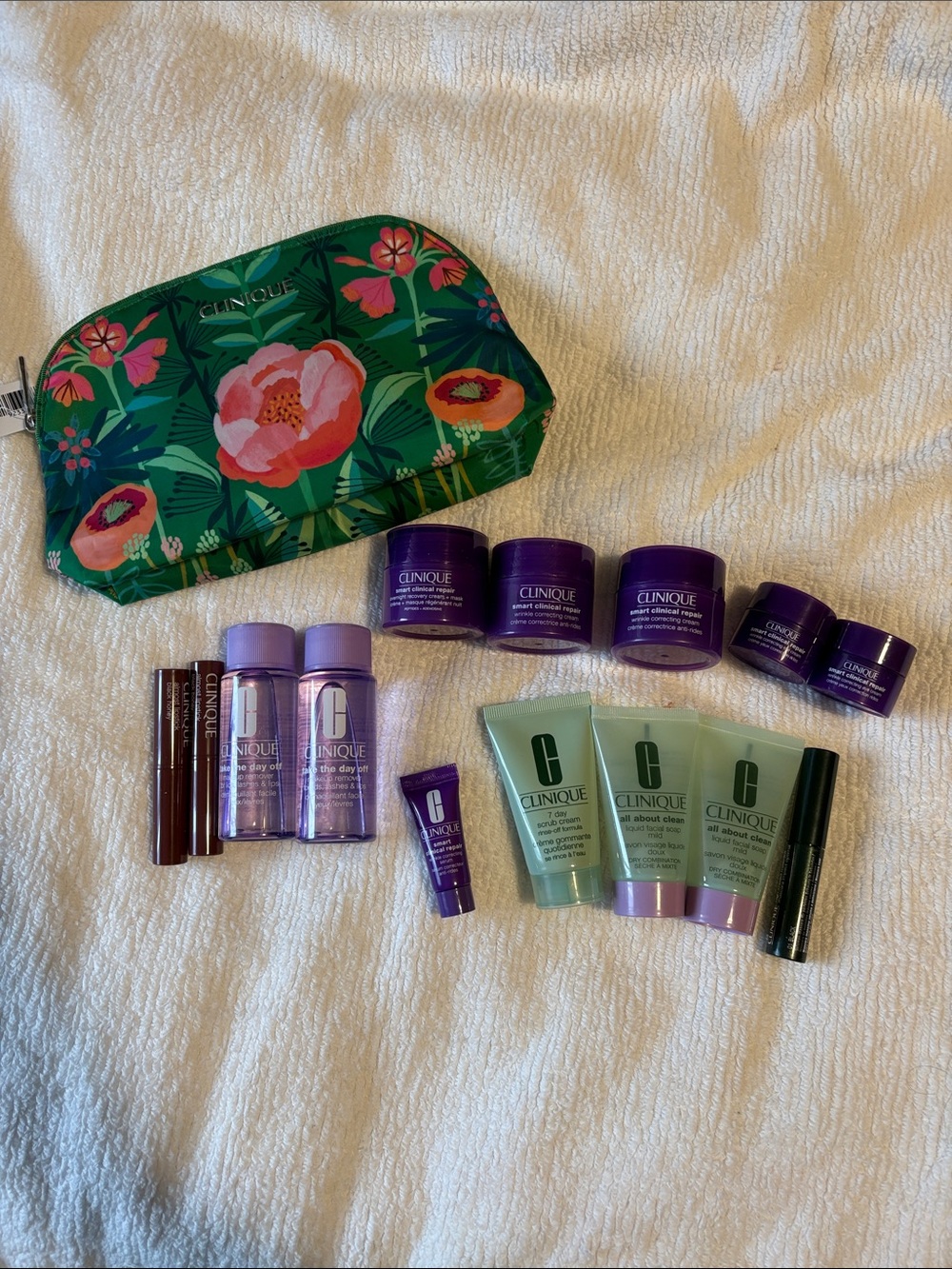 Clinique minis - smart clinical repair, black honey, etc - and make up bag